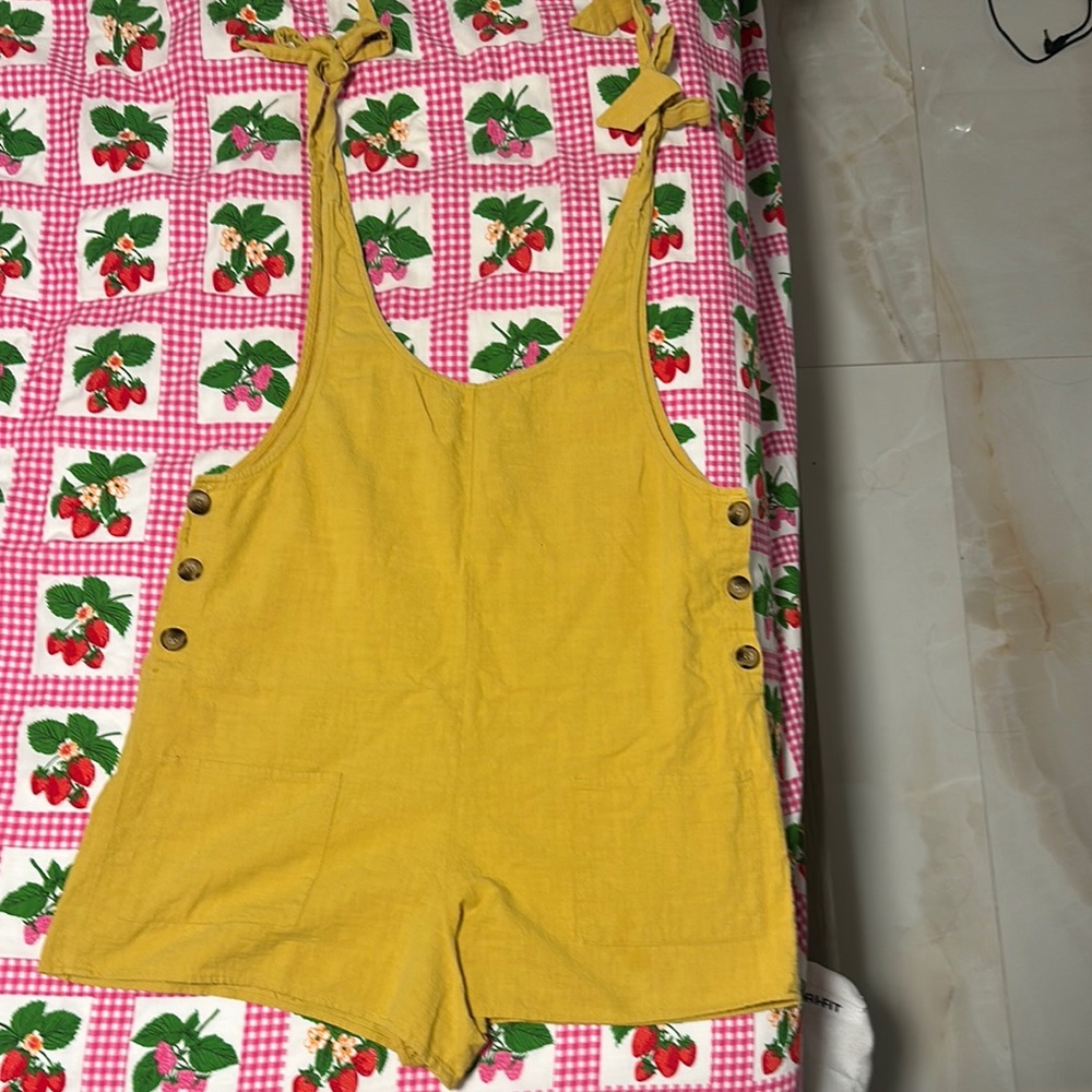 Yellow Sleeveless Jumpsuit with Button Detail
